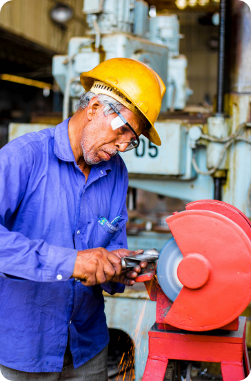 Machinist working in a small manufacturing shop