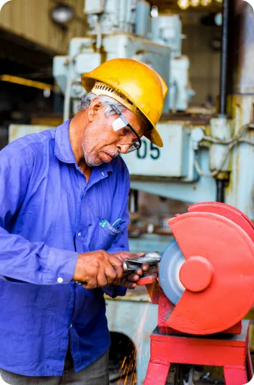 Machinist working in a small manufacturing shop