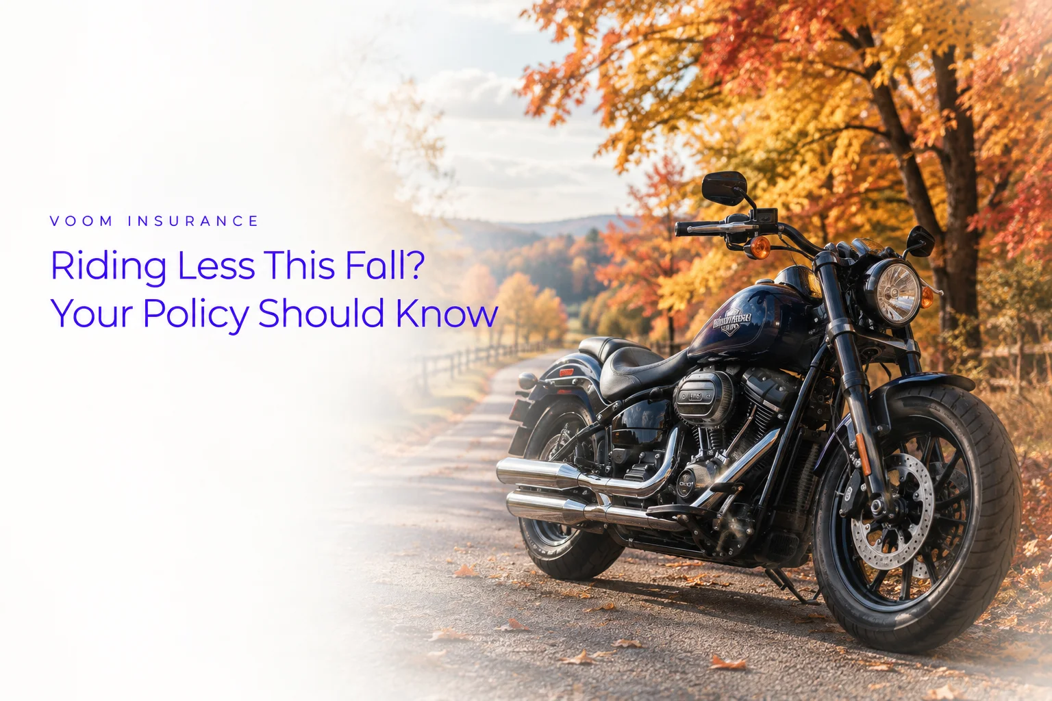 Cruiser motorcycle on autumn country road with orange fall foliage
