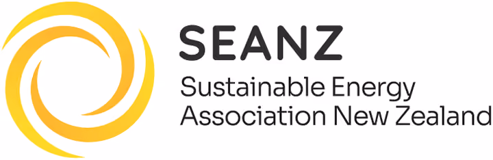 Logo of SEANZ Sustainable Energy Association New Zealand with yellow spiral symbol.