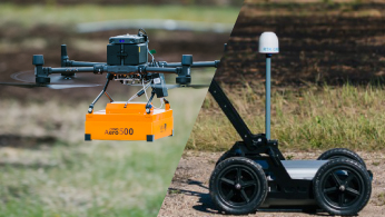 Researchers configuring a drone-mounted sensor system on a field worktable