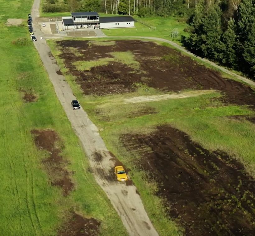 The test vehicles are parked on the profile line at the test site.