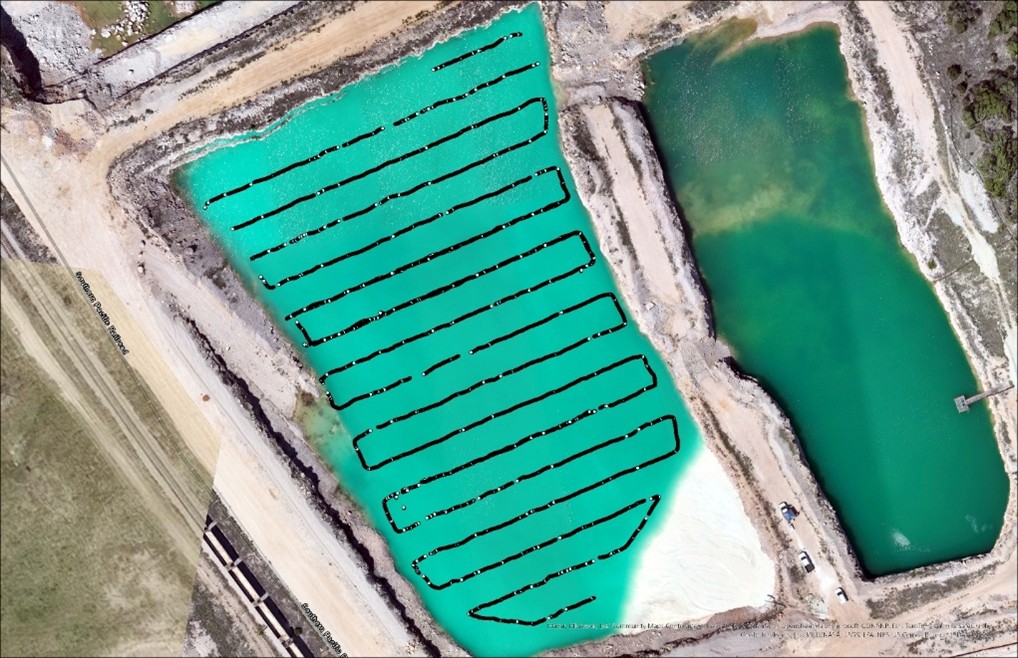 Image of quarry pond with UAV bathymetry survey flight path lines in UgCS during sediment mapping in Texas, May 2025