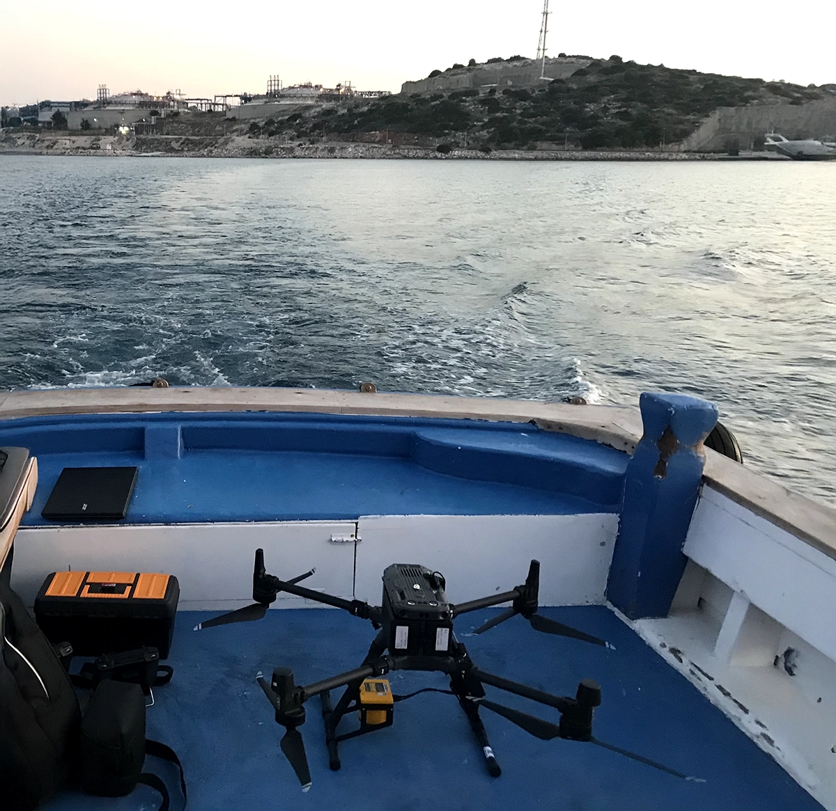 Ileron conducting a UAV mission using SPH Engineering’s SkyHub onboard computer and Falcon detector, with drone setup on a boat deck.