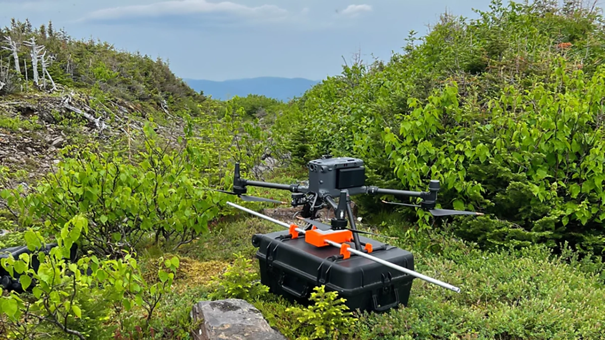 DJI M350 RTK with Zond Aero LF drone-based GPR mounted on top of a transport case during field setup in the Chic-Choc Mountains, Quebec.