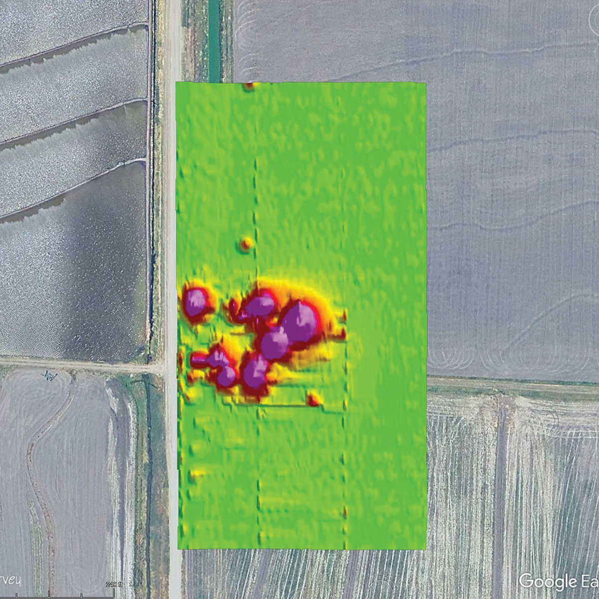 UAV magnetometry results showing a magnetic anomaly from an abandoned gas well masked by irrigation-related features.