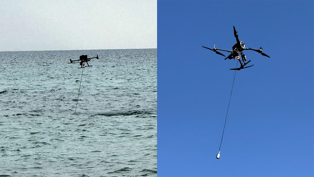 DJI Matrice 300 RTK carrying an echo sounder over coastal waters during a UAV-based bathymetric survey.