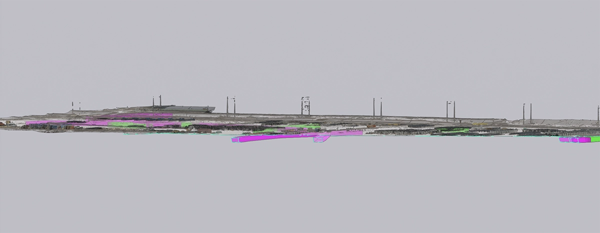 Side view of a mining-site model showing interpreted subsurface features