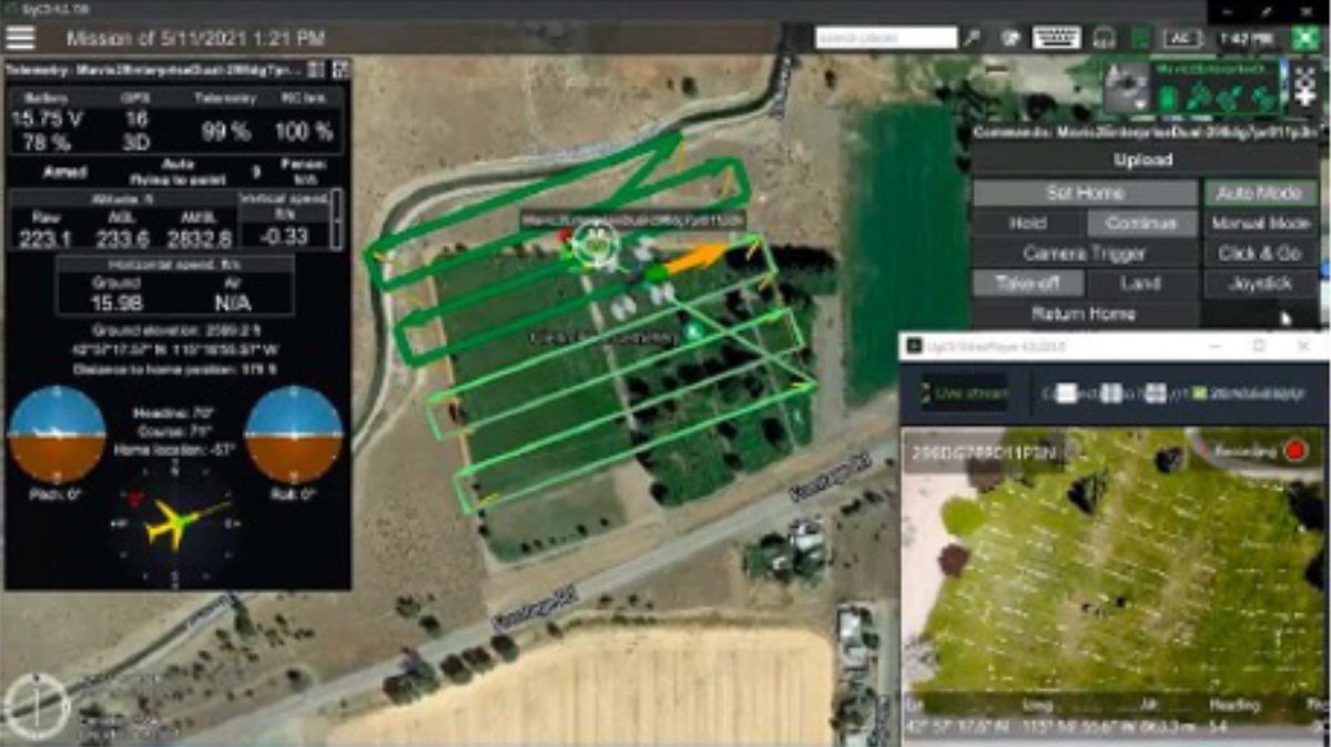UgCS interface with a cemetery survey route, aircraft telemetry and live camera view