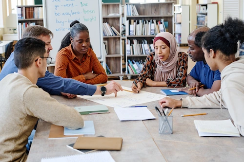 community members sitting at table