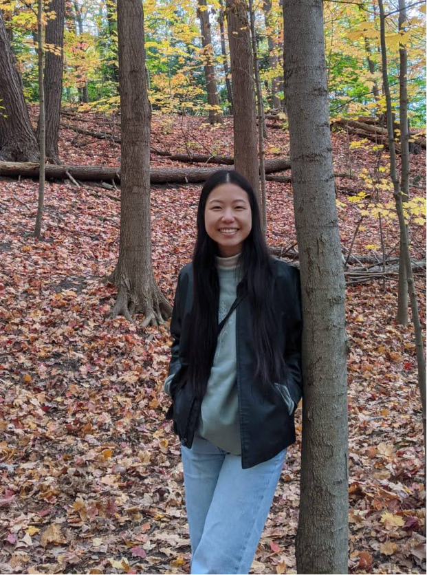 Picture of Rebecca Hsiung by a tree