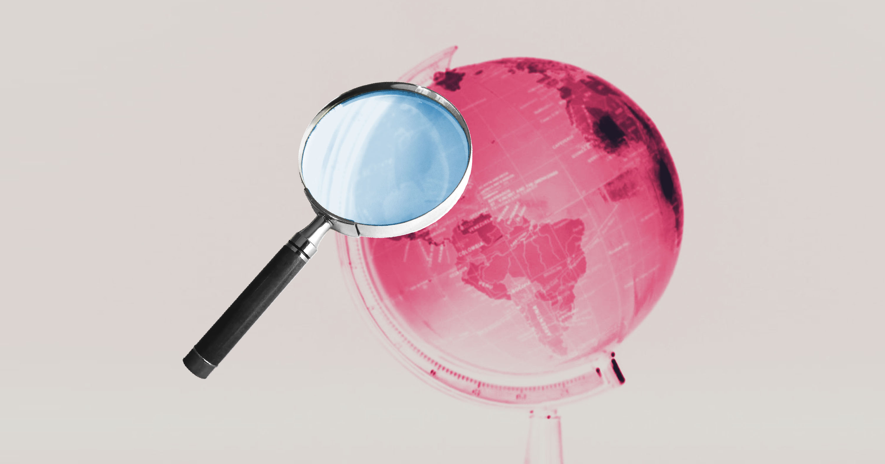 An illustration of a magnifying glass over a globe