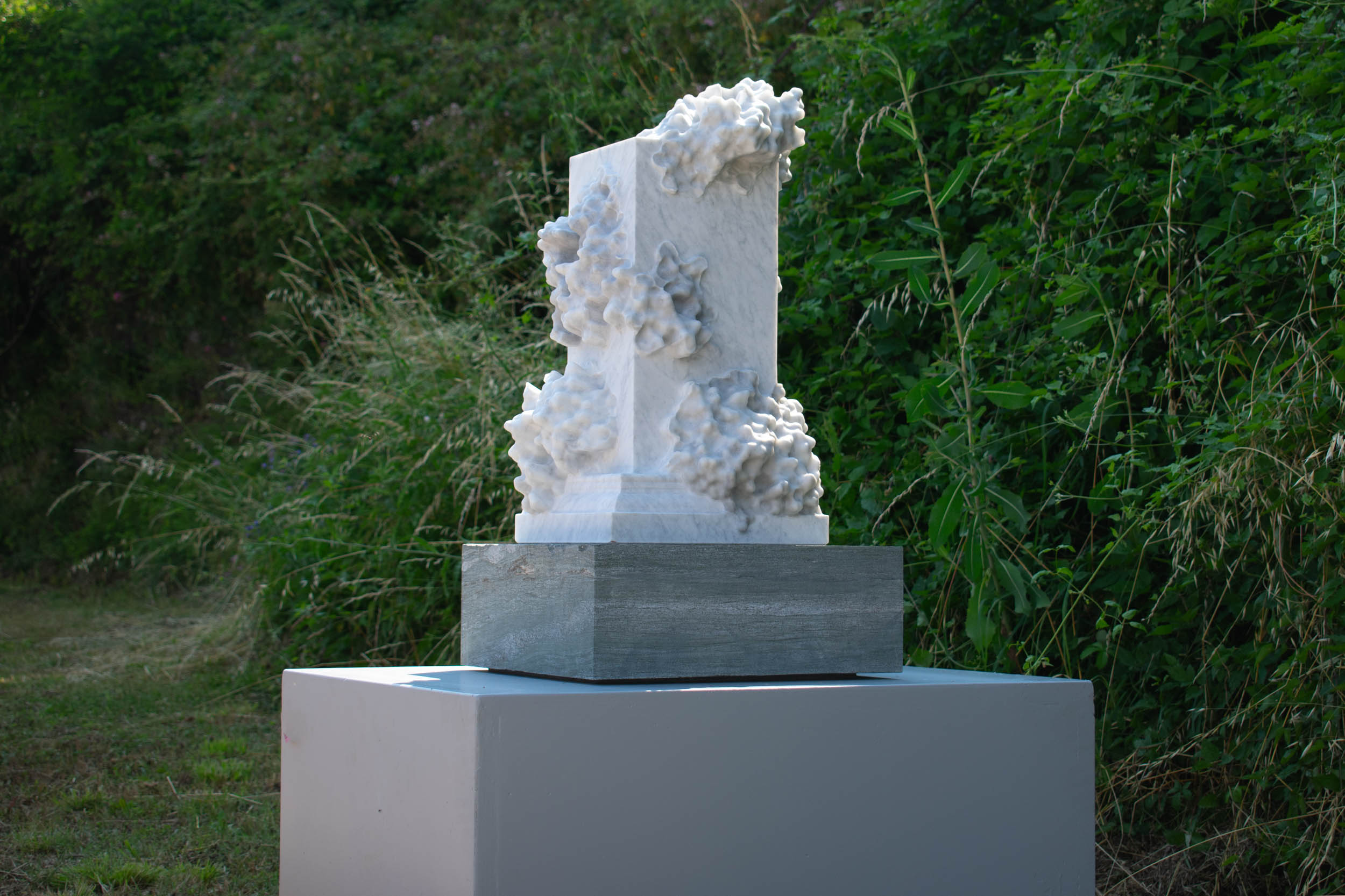 installation view of "The Foragers", 2026, robotically carved Bianco Carcaraia marble sculpture with hand-finishing, approx. 66 H x 31 W x 31 D cm