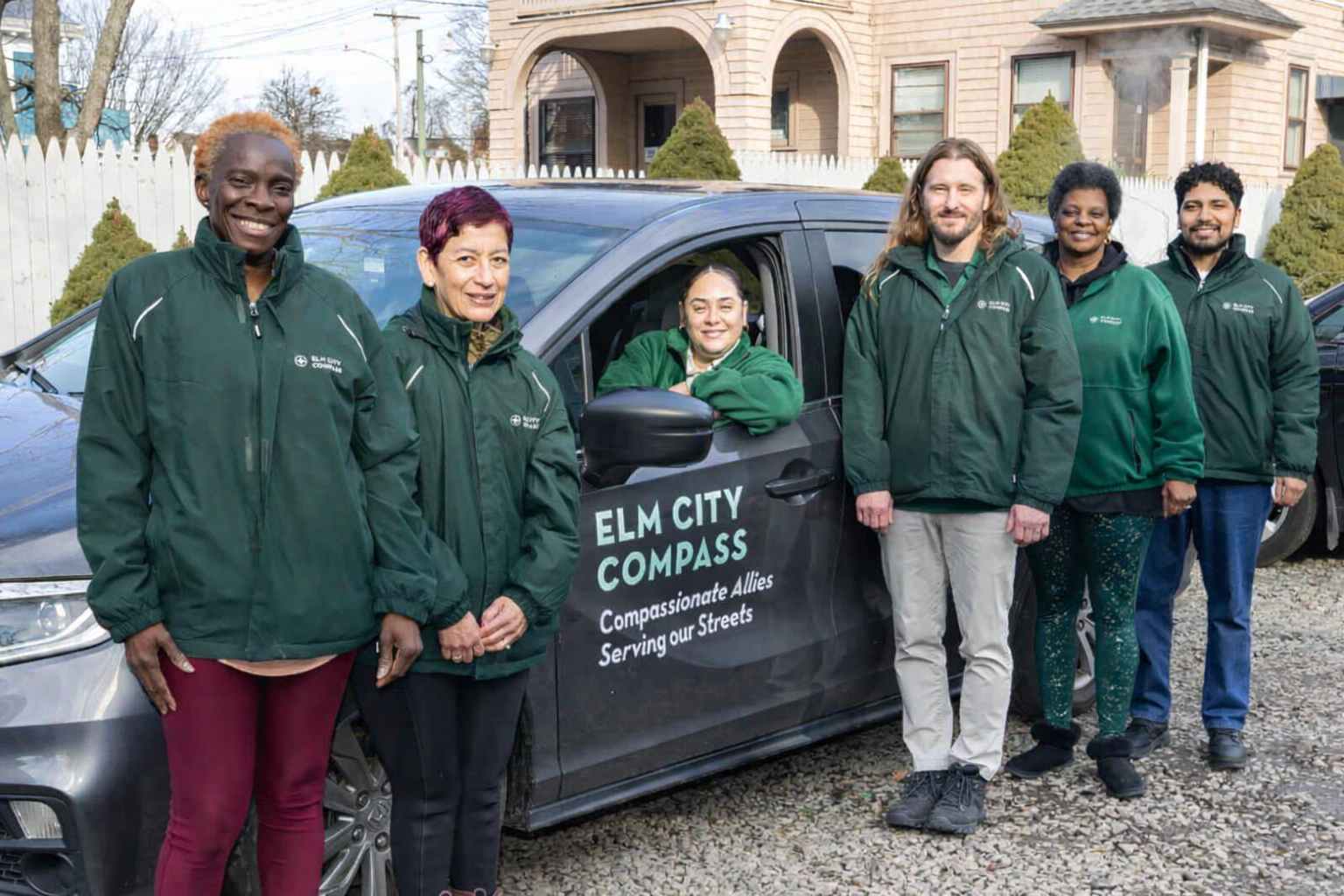 COMPASS team with van