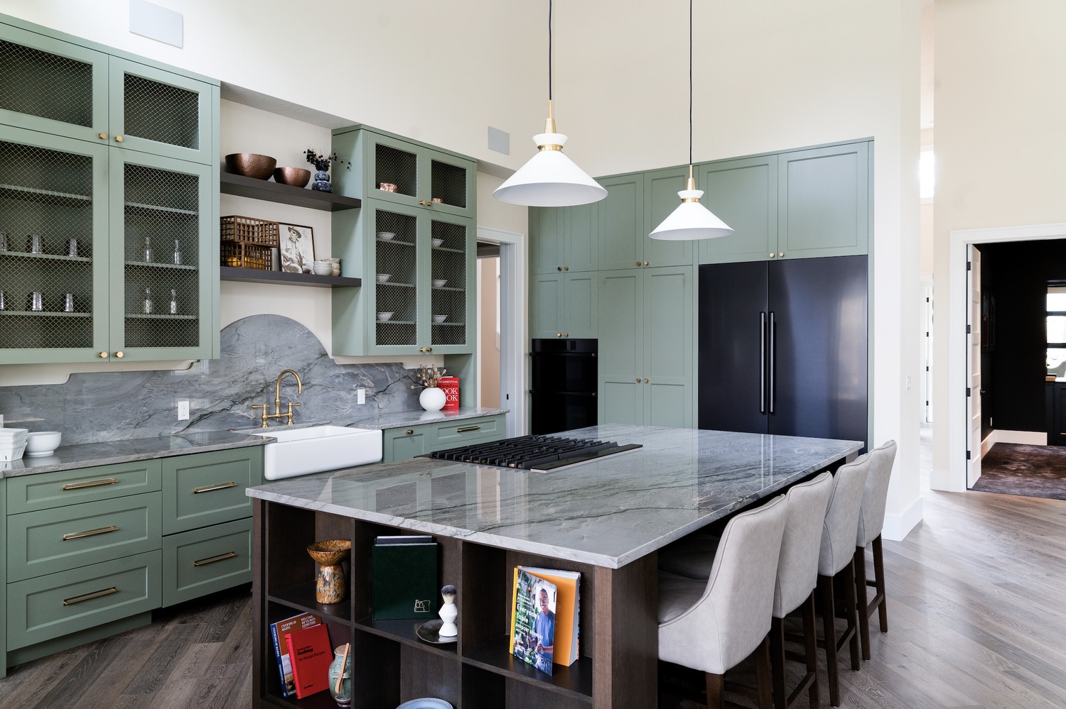 bright kitchen with teal/green cabinets