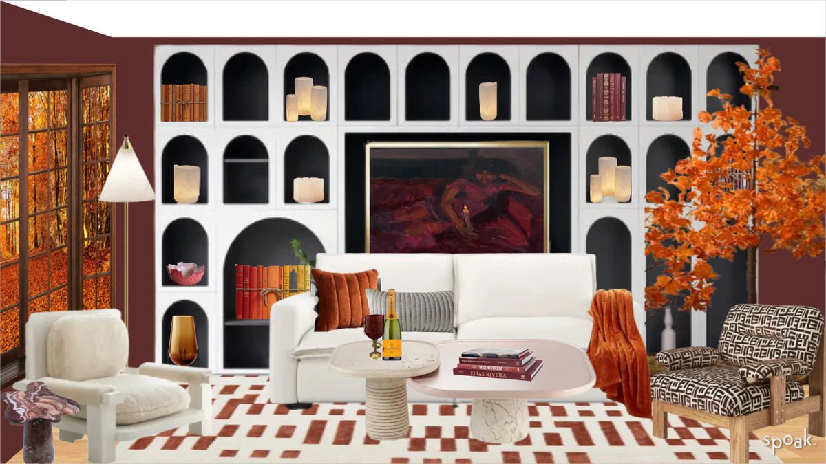 A maroon living room with big bookshelves and a white sofa