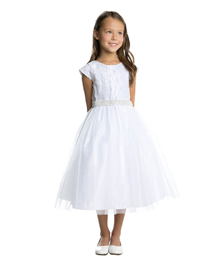 little girl wearing white dress
