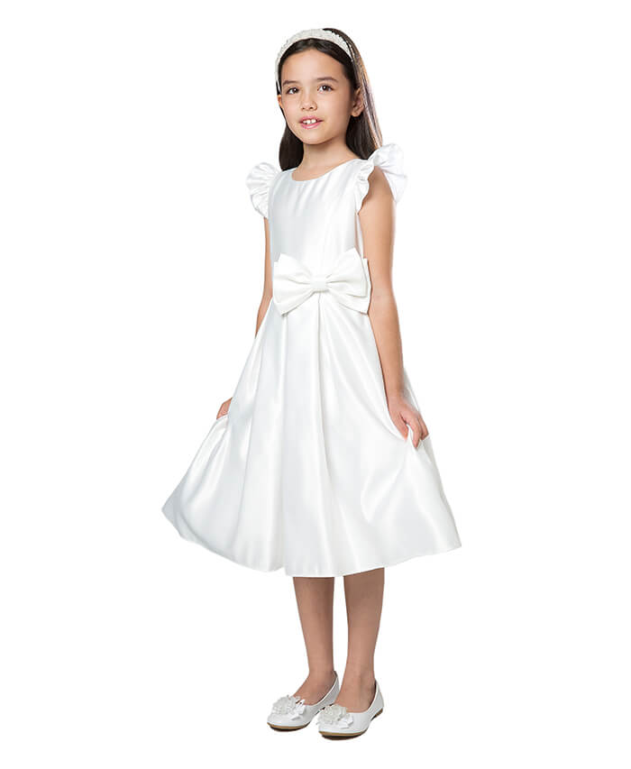 little girl wearing a white dress