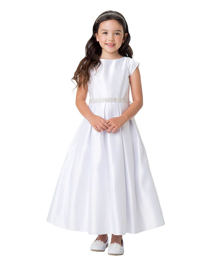 little girl wearing a white dress