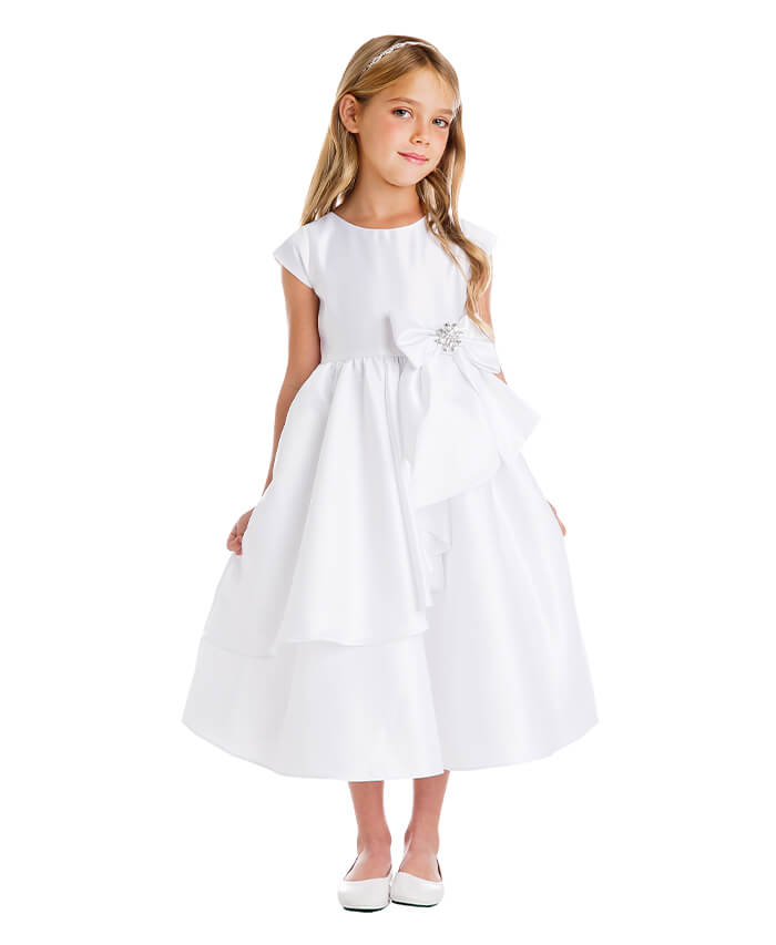 little girl wearing a white dress