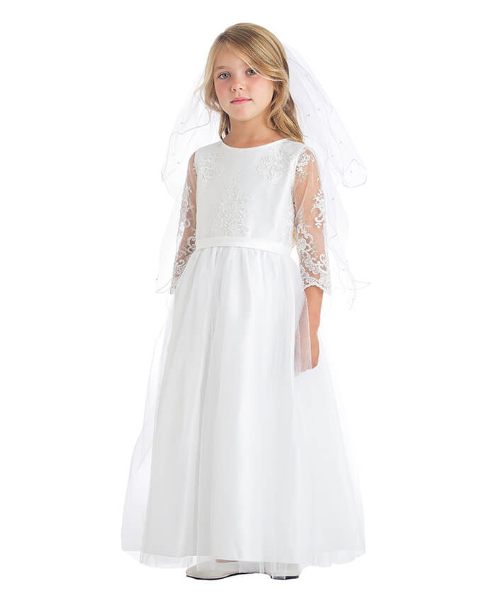 little girl wearing a white dress