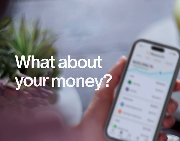 Person holding a smartphone displaying a financial app with the text 'What about your money?' in white.