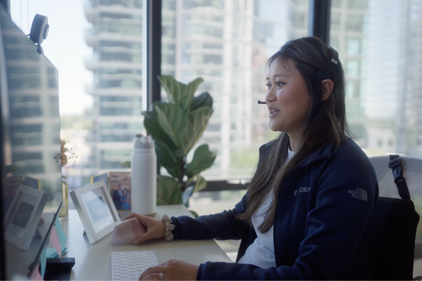 older woman on phone outside taking telehealth appointment
