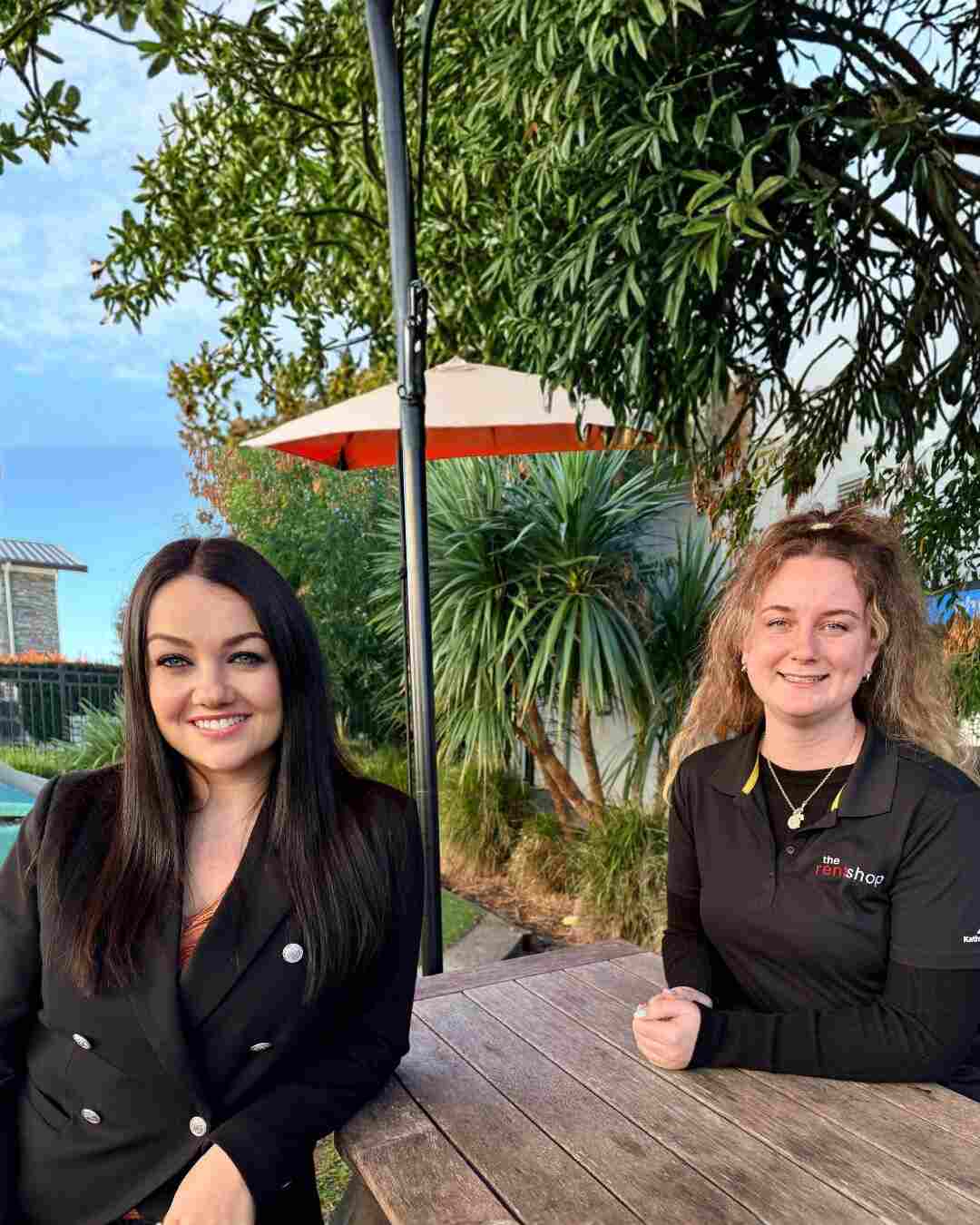 Two property managers smiling