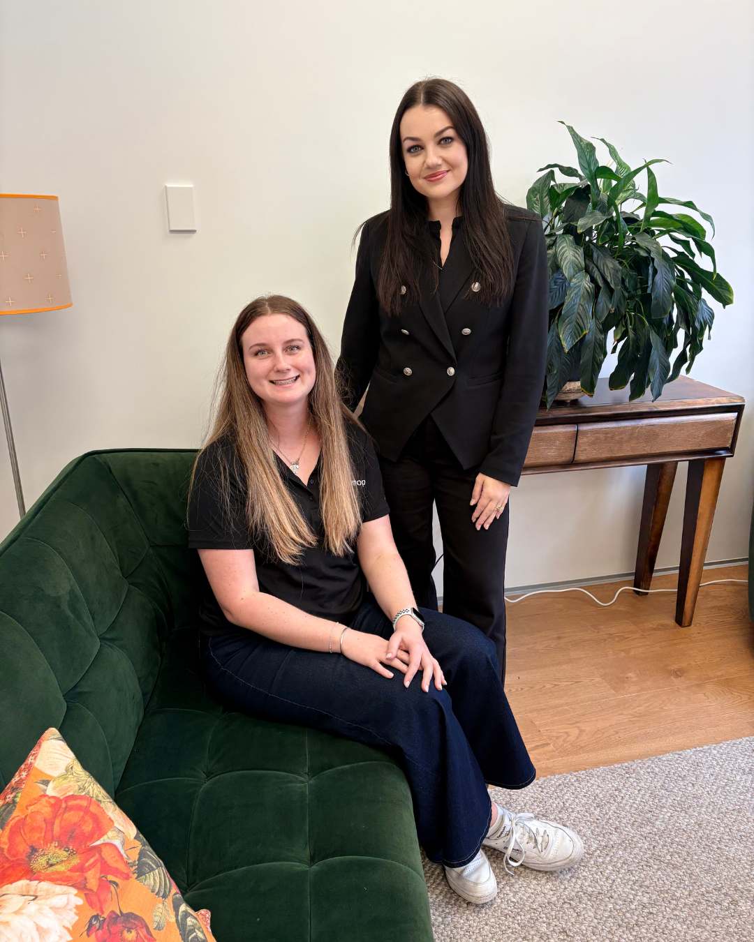 Two property managers smiling