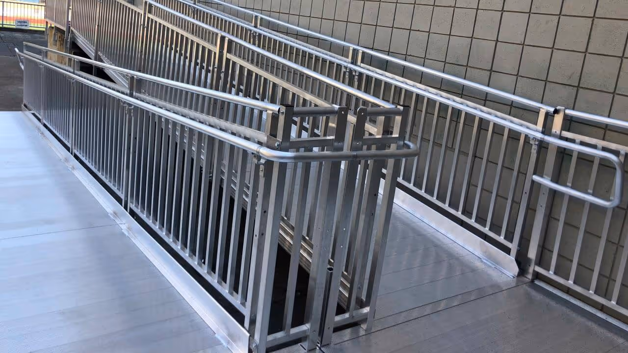 Straight outdoor stairlift installed on a long residential staircase, built for all-weather performance and safe outdoor mobility access.