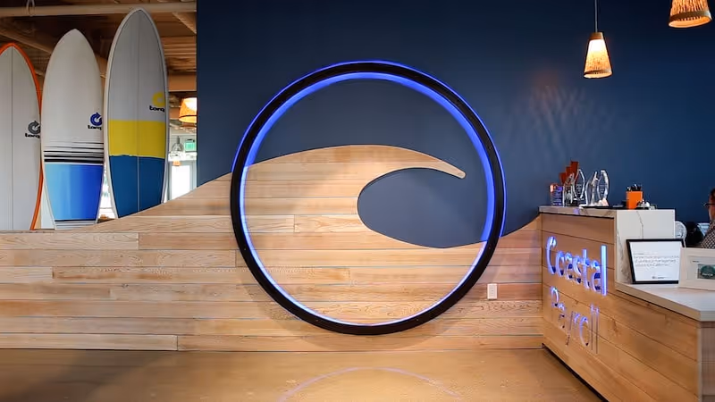 A wave installed onto a wall at Coastal Payroll's office