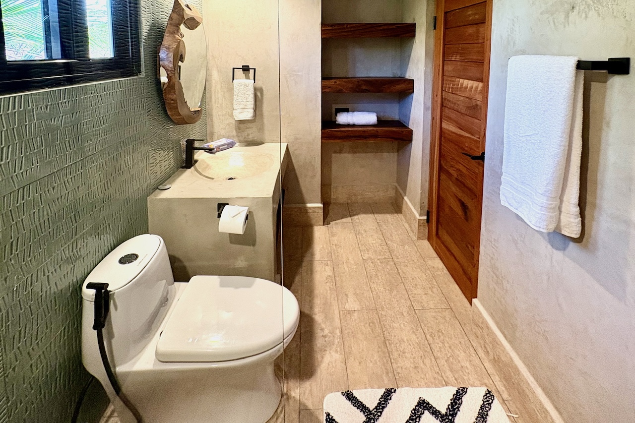 Modern private bathroom inside the Wave View Room at Miramar SurfCamp in Nicaragua