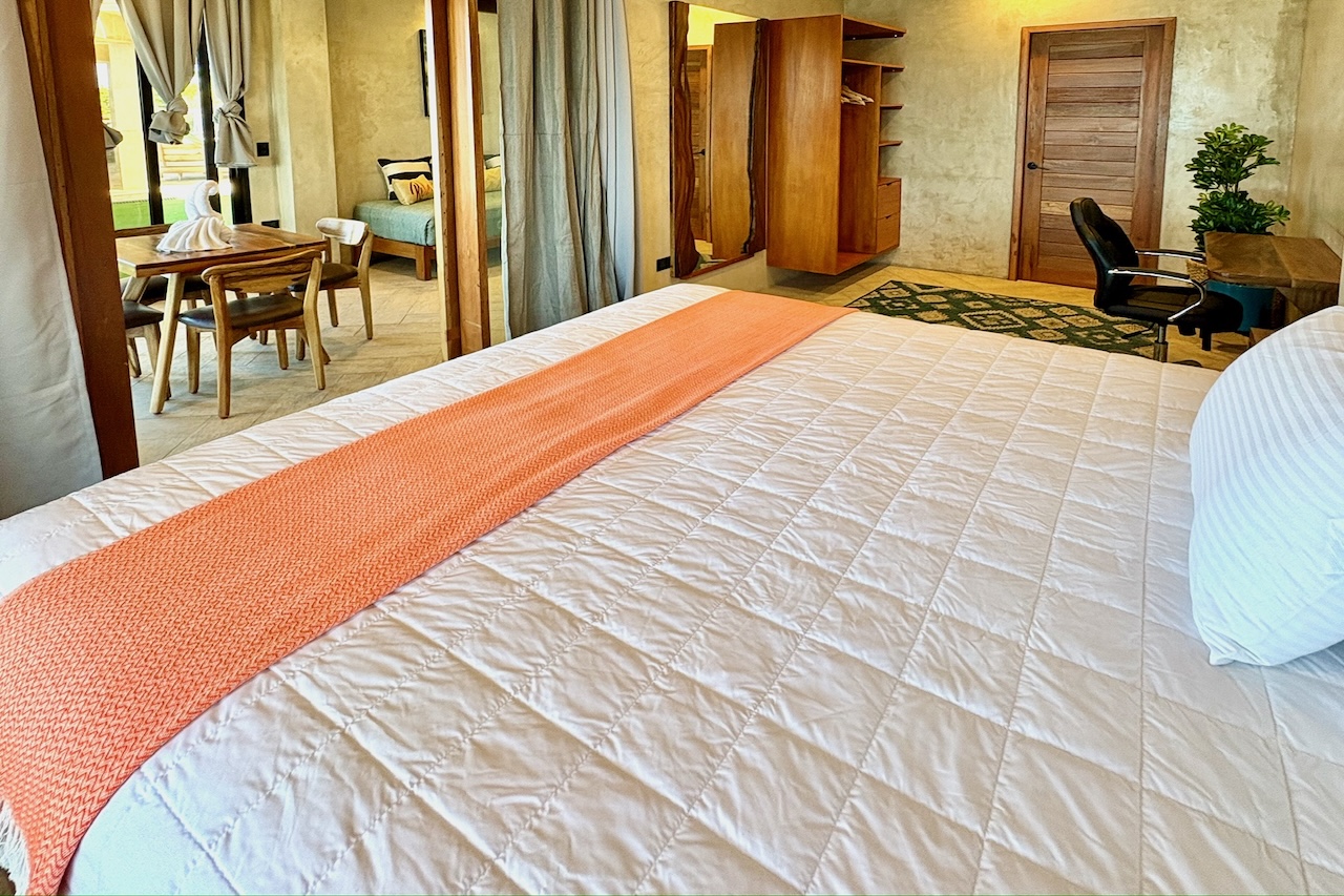 Bedroom with ocean view in the Ocean Master Room at Miramar SurfCamp