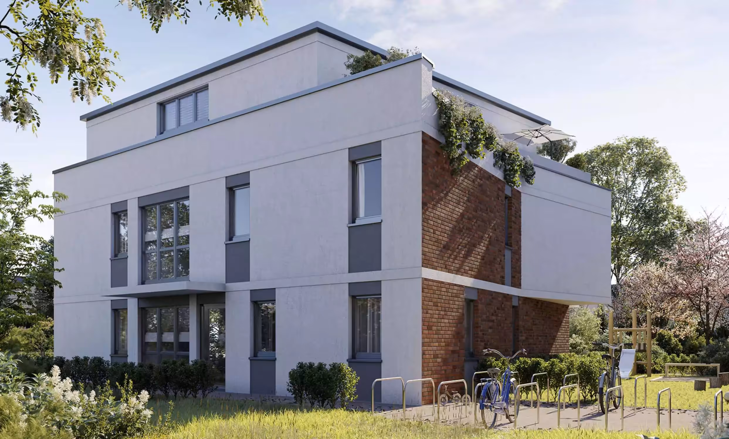 Neubau von zwei Mehrfamilienhäusern mit insgesamt 18 Wohneinheiten Außenansicht der weißen Putzfassade