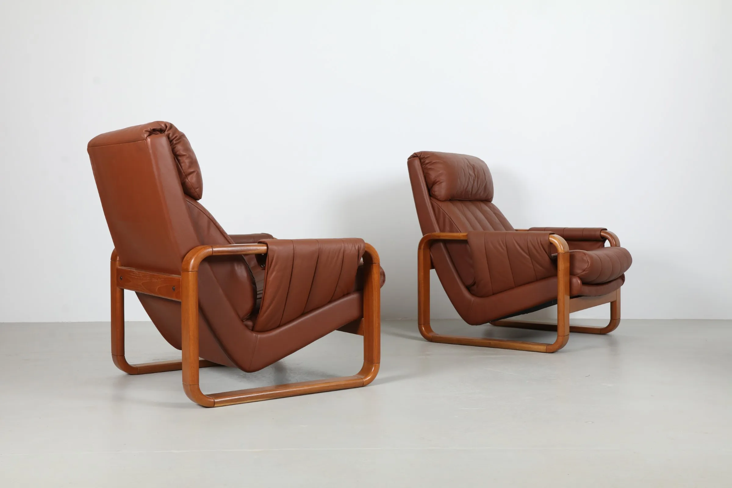 Pair of Bold Sleigh Leg Armchairs by Mitre Furniture