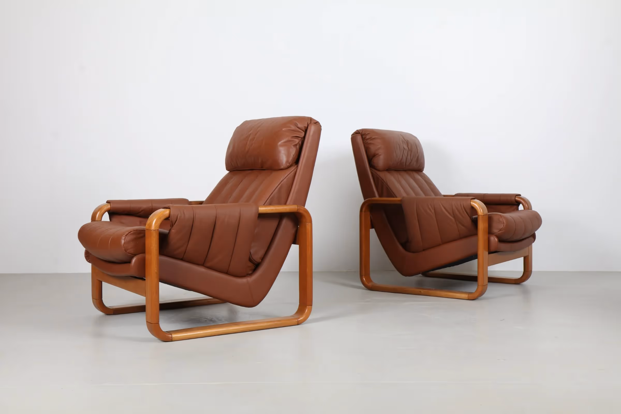 Pair of Bold Sleigh Leg Armchairs by Mitre Furniture