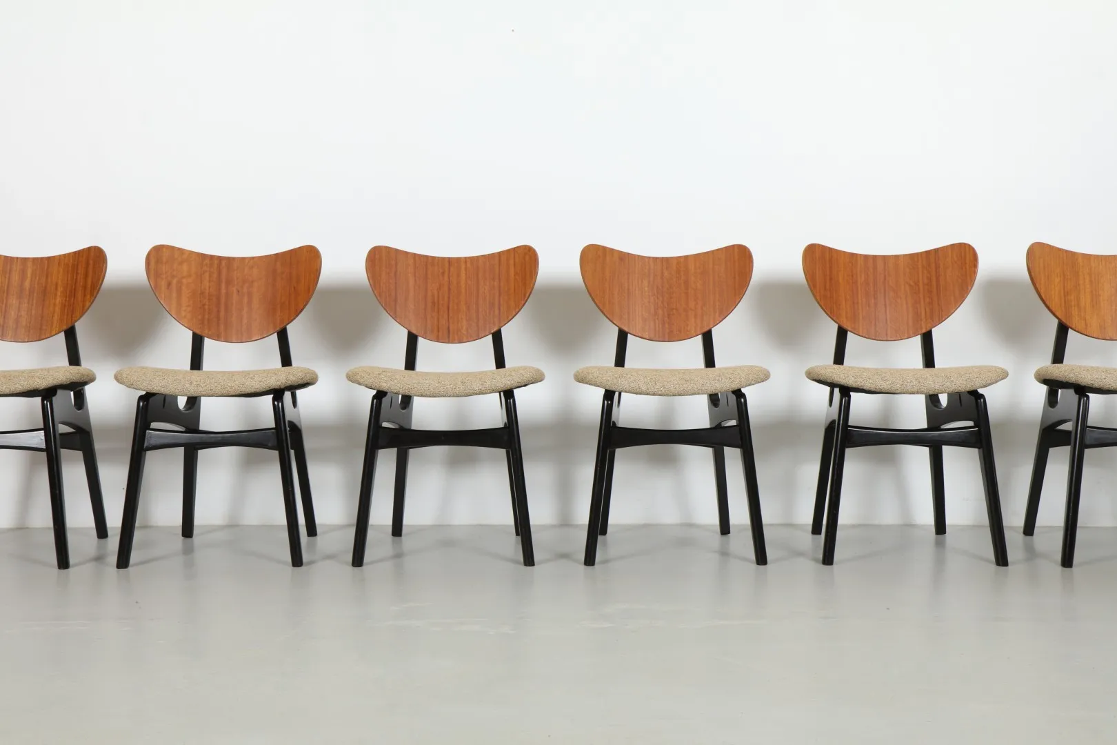 Eight Sleek Victor Wilkins Tola and Black 'Model T634' Dining Chairs by G-Plan