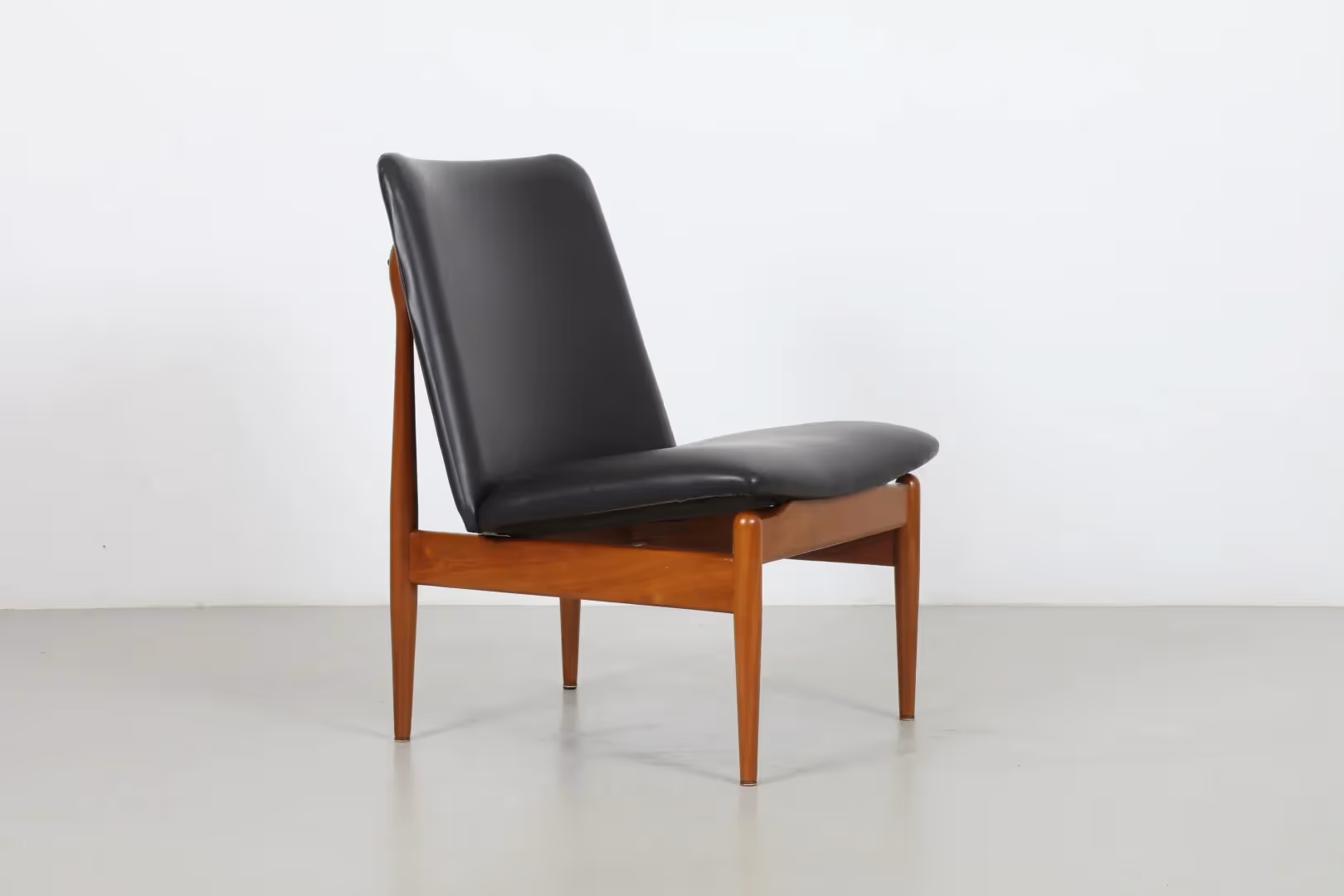 Sleek NZ Made Spade Back Lounge Chair by Unit Style