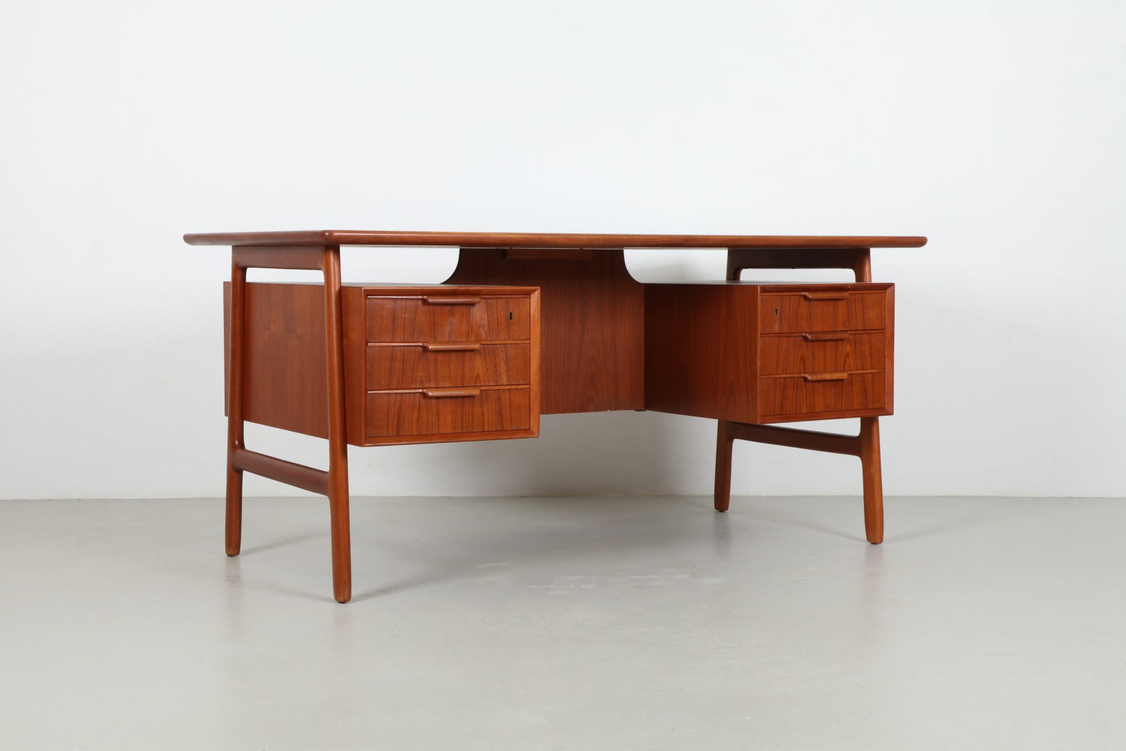 Coveted 'Model 75' Teak Executive Desk by Omann Jun