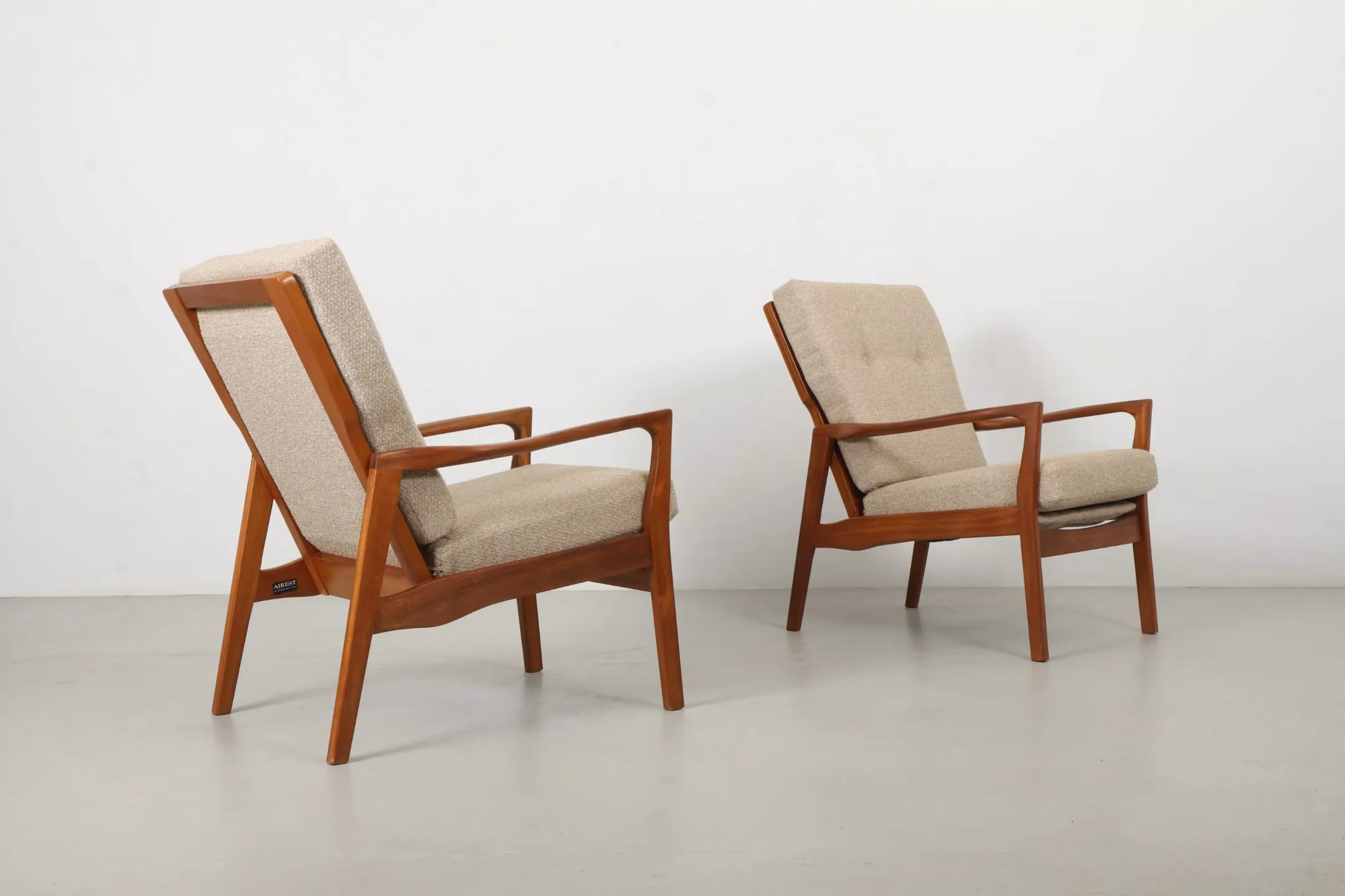 Pair of Sleek NZ Made Mahogany Armchairs by Airest