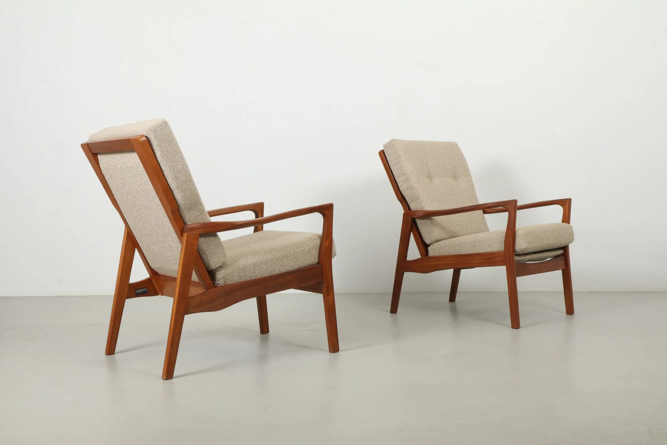 Pair of Sleek NZ Made Mahogany Armchairs by Airest