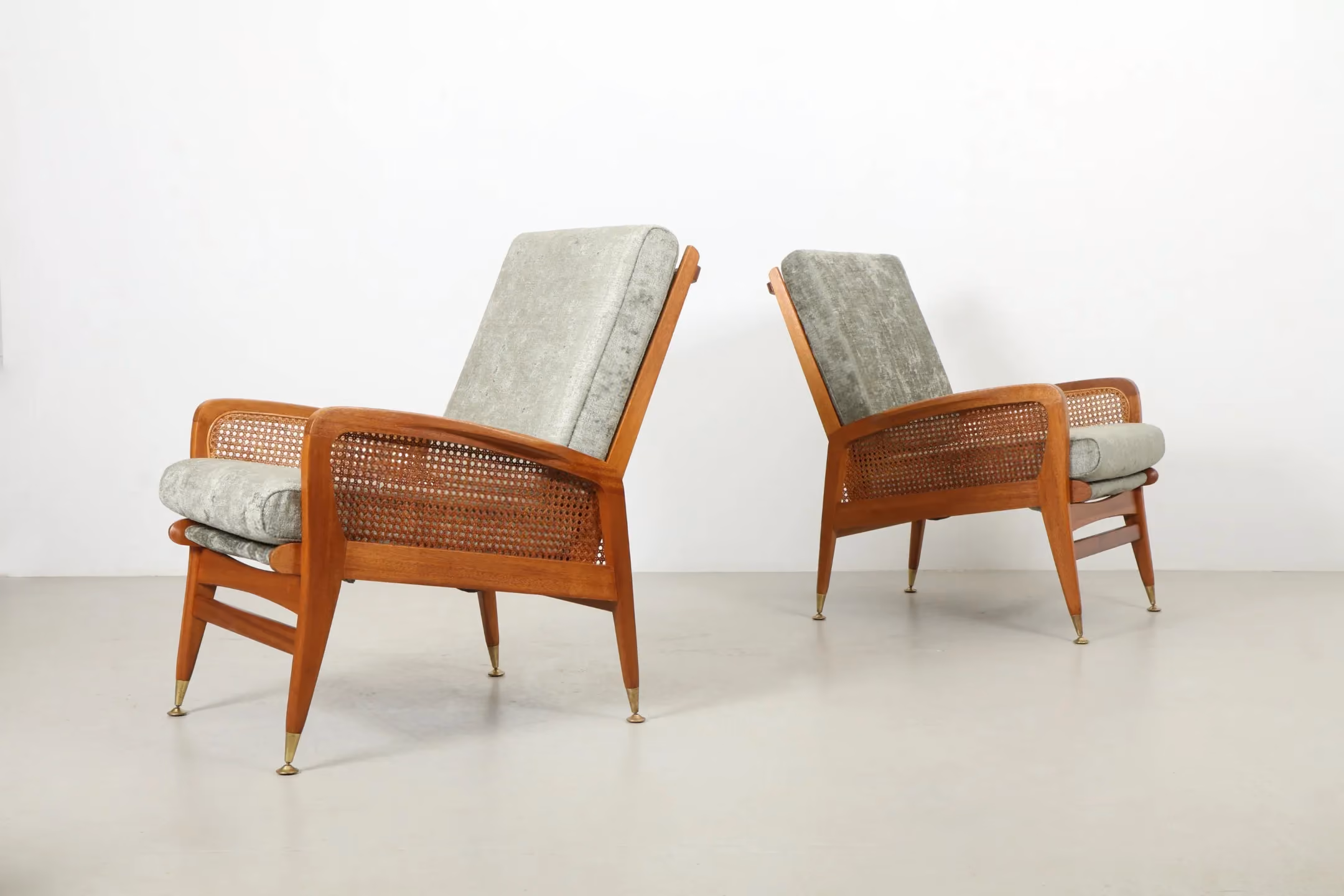 Pair of Curvaceous NZ Made Armchairs with Rattan Detailing