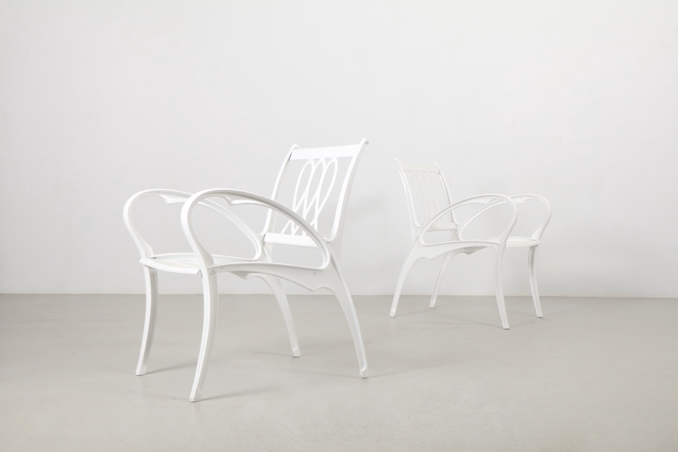 Four Sculptural Hunter Douglas Aluminium Outdoor Chairs by Flexalum