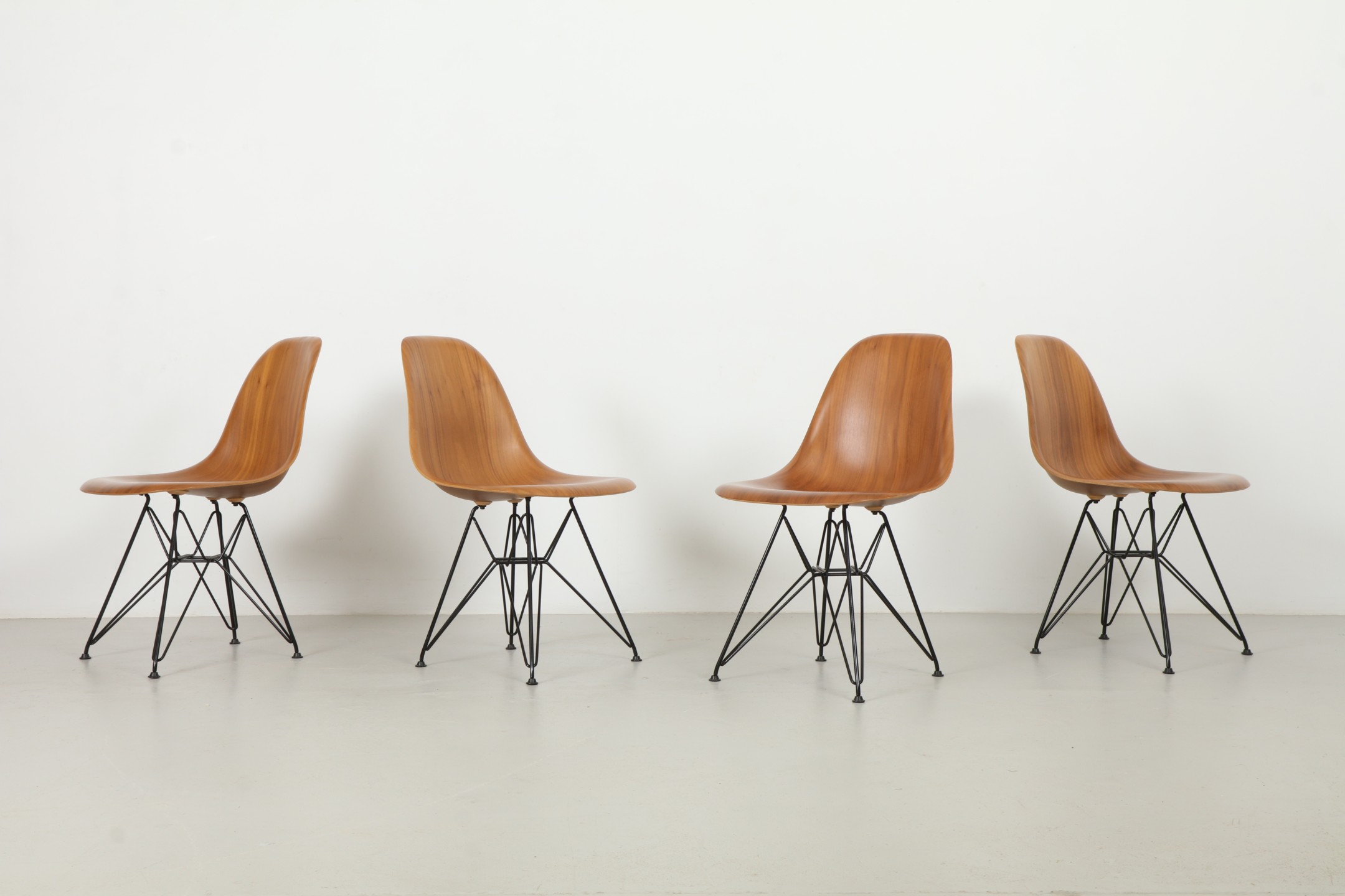 Four Stunning Eames 'DWSR - Eiffel' Walnut Dining Chairs by Herman Miller