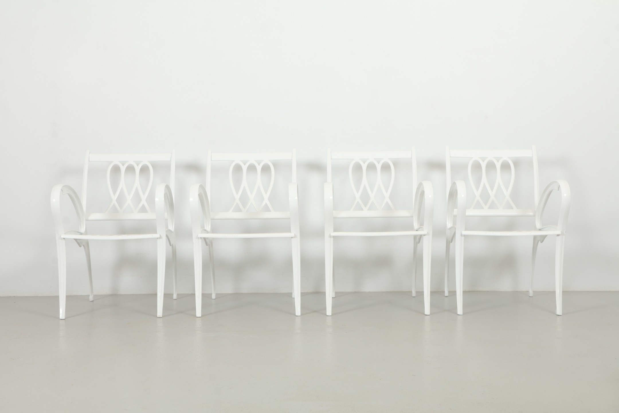 Four Sculptural Hunter Douglas Aluminium Outdoor Chairs by Flexalum