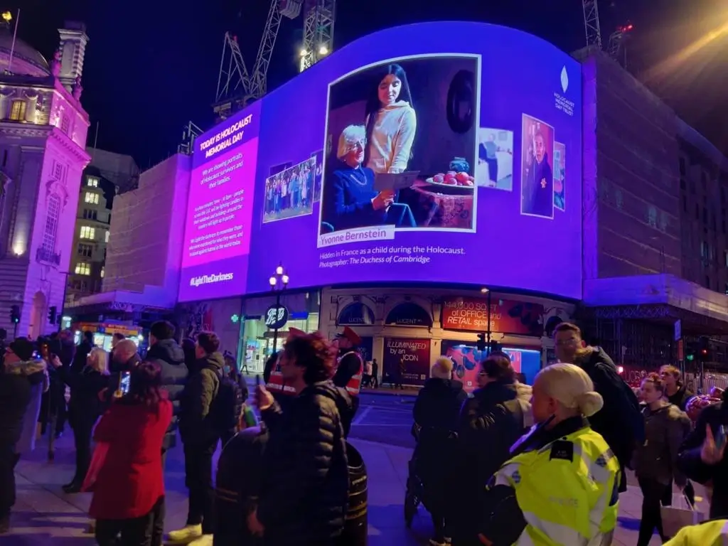 The HMDT video playing in Trafalgar Square