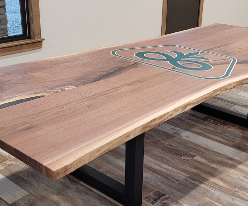 Walnut Conference table with Pioneer Logo Engraved.