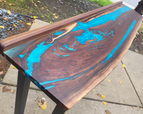 Walnut wet bar with electric blue epoxy.