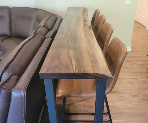 Walnut behind the couch bar. 