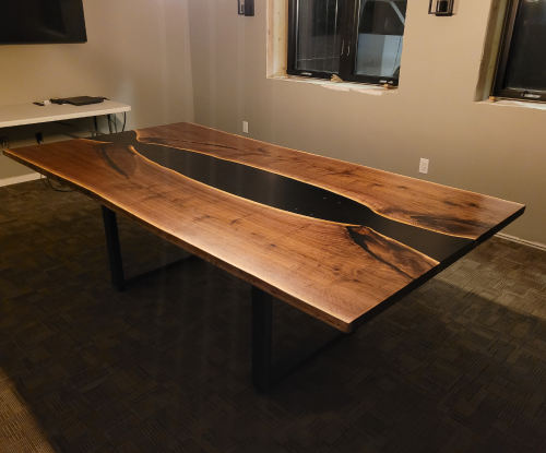 Walnut book matched conference table. 